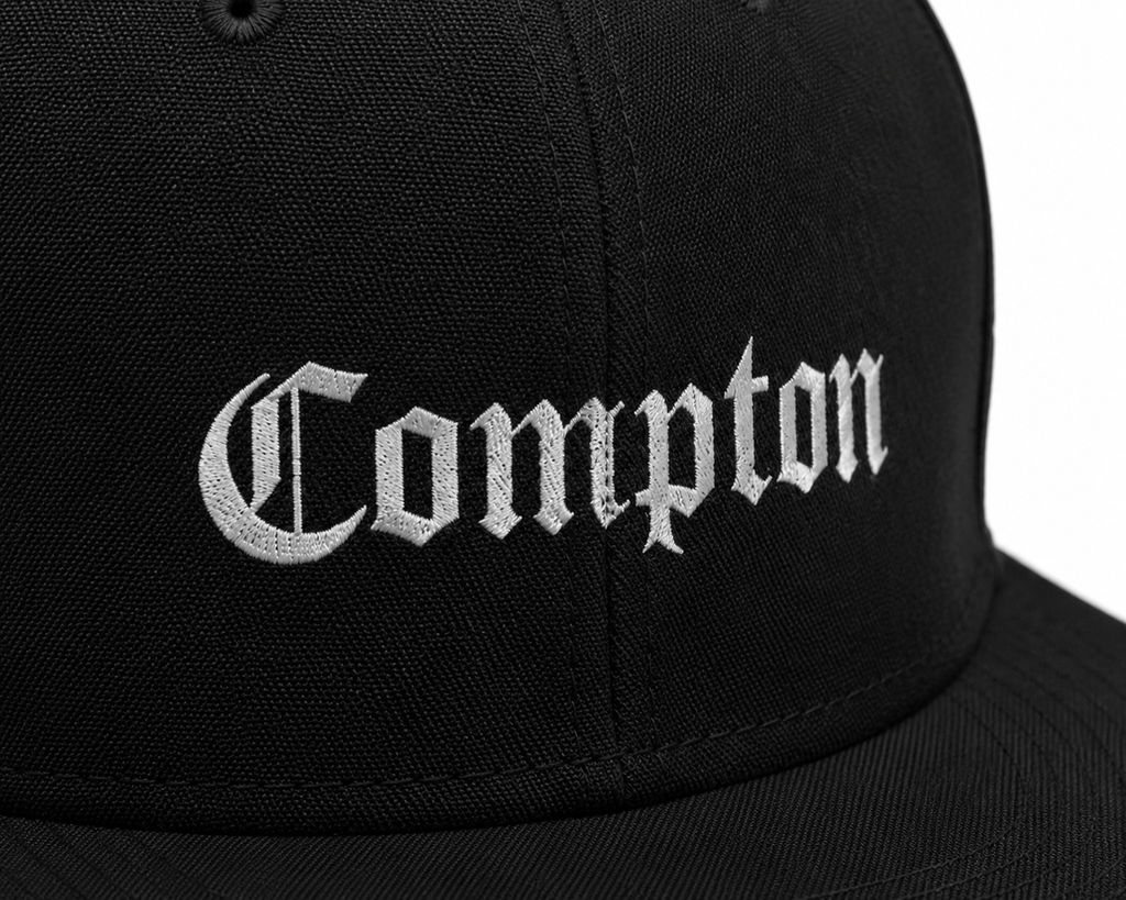 Compton OG Unisex Snapback Cap With White Gothic Lettering Design