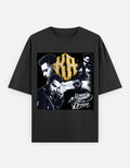 Karan Aujla black gold grunge gravitas oversized graphic t-shirt front, street culture, Punjabi pop energy and attitude, bold typography.
